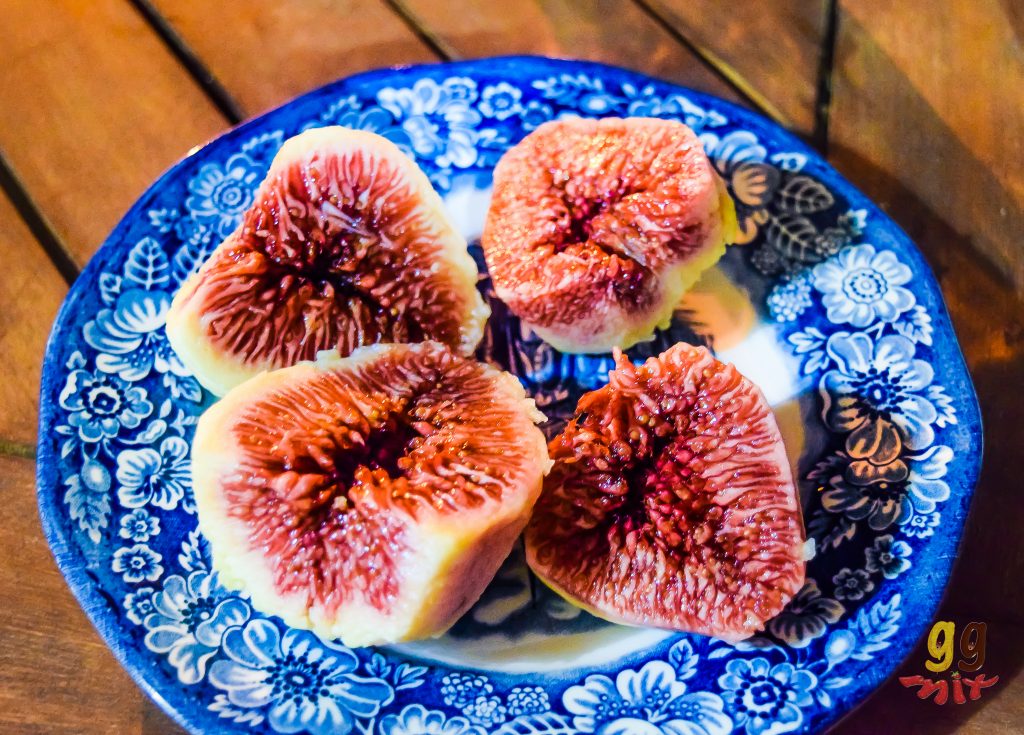 A PLATE OF FIGS - SYKA CUT IN HALF